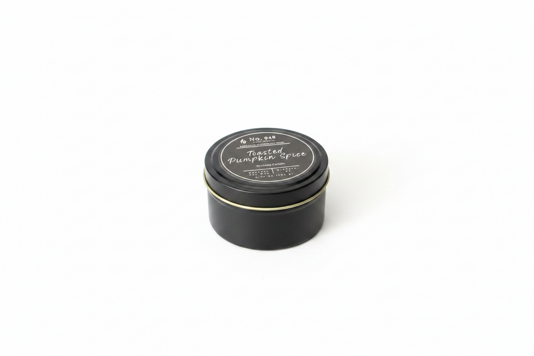 5.75 oz Wickless Candle made from coconut soy wax in a black tin with a gold rim, labeled "Toasted Pumpkin Spice.