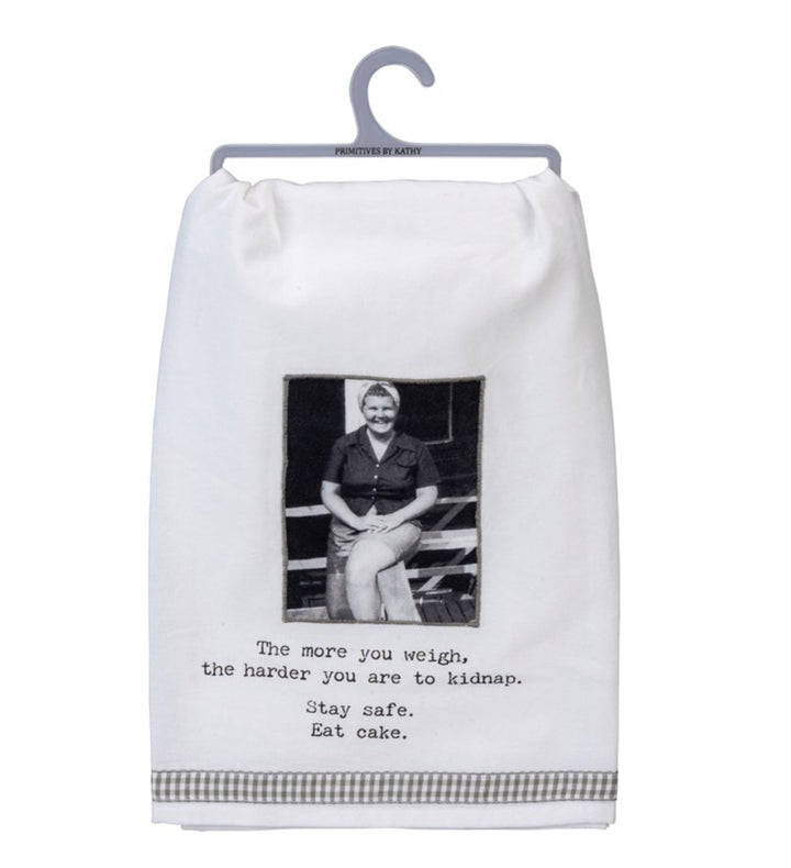 Cotton kitchen towel with humorous cake slogan. Available sizes: 16"x28", 18"x28". Black-and-white design.