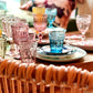 Marseille & Remi Glass Blush goblets in pink, blue, green, and yellow shown. Available in small and large sizes.