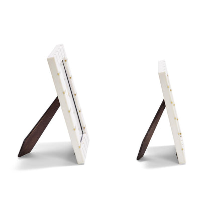 Set of two Brass Lines Photo Frames with black stands, one larger and one smaller, both empty and tabletop-ready. Sizes: large and small.