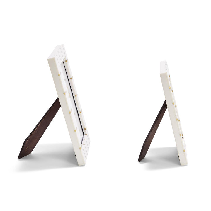 Set of two Brass Lines Photo Frames with black stands, one larger and one smaller, both empty and tabletop-ready. Sizes: large and small.