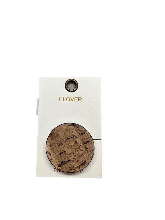A fashionable white tag with a circular wooden sample and "PHONE GRIP" printed in gold. Small round hole at the top for easy attachment. Available sizes: One Size.