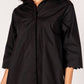 This black Poplin button up dress features a unique scalloped him on the bottom, as well as the sleeves. The fabric makes it comfortable for all day, where it comes in extra small, small, medium and large.