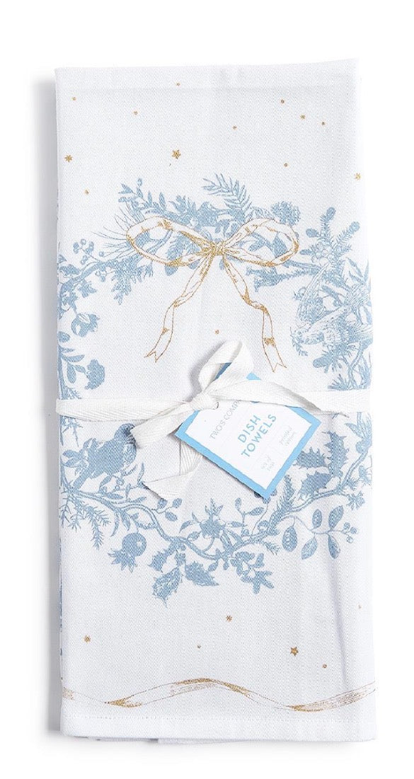 Gilded Cottage Dish Towels with white and blue botanical wreath, ribbon, and gold star print.