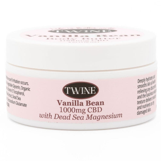 White jar with pink label: "TWINE Vanilla Bean Body Butter," contains 1000mg CBD, Dead Sea Magnesium. Sizes available.