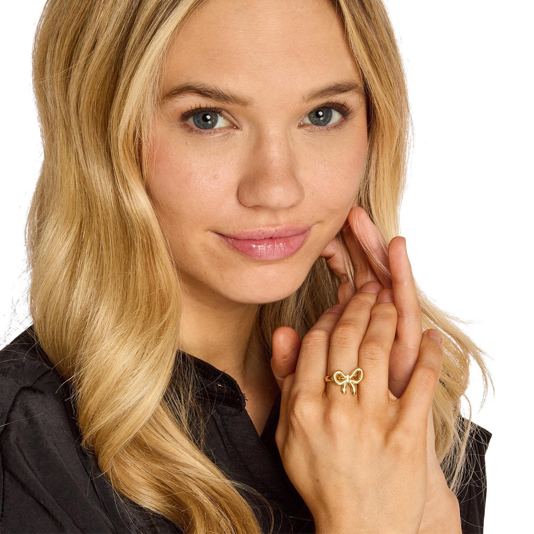 Forget Me Not Ring: Adjustable gold ring, available in sizes 5-9.