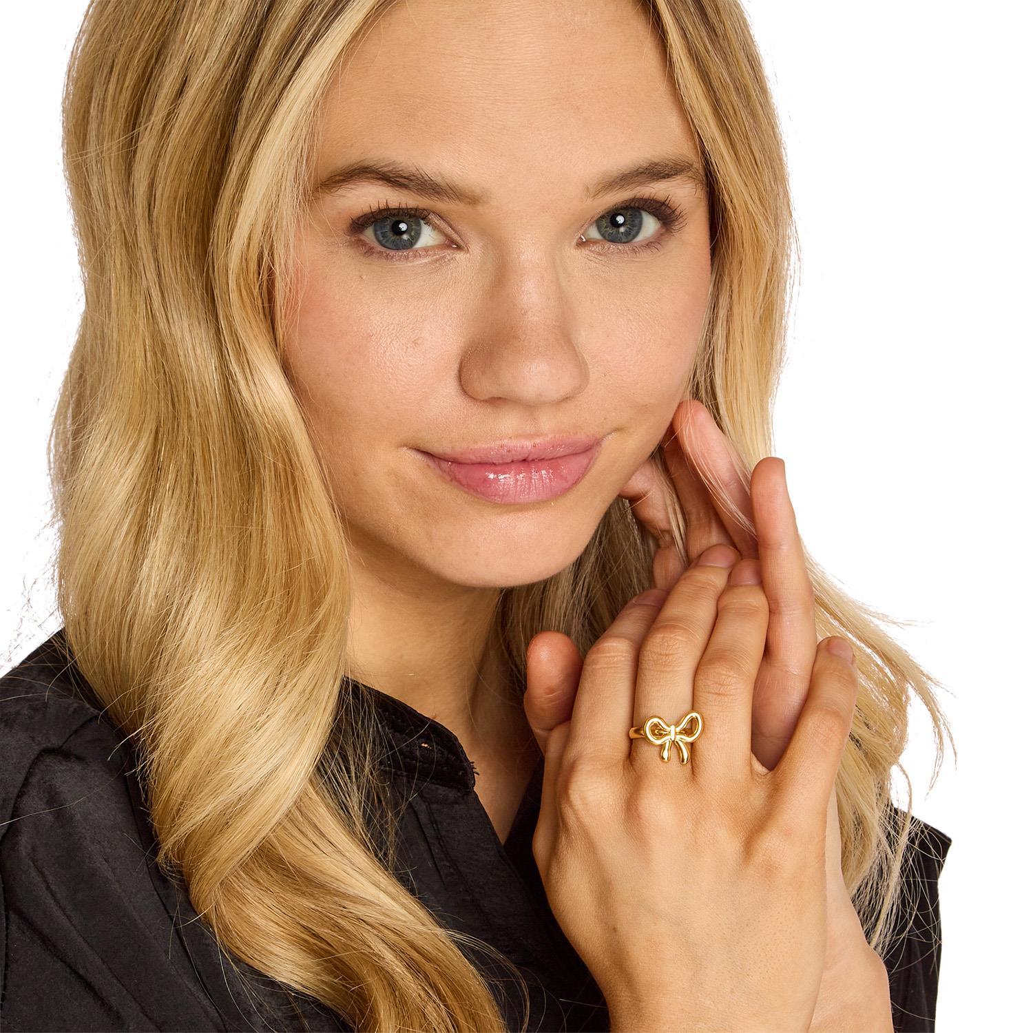 Forget Me Not Ring: Adjustable gold ring, available in sizes 5-9.