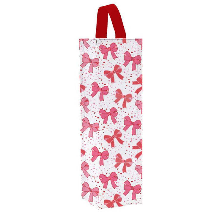 Holiday Wine Bag with pink ribbon bow pattern and red fabric handle.