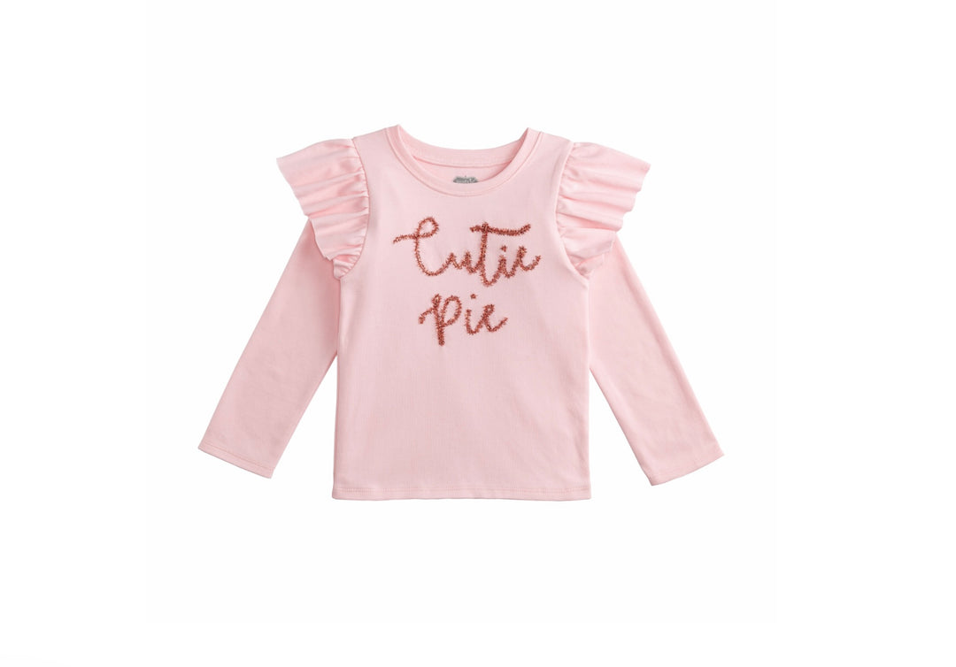Pink Pumpkin Tinsel Tee: light pink long-sleeve toddler shirt with ruffled shoulders and glittery “Cutie Pie” lettering. Sizes available.