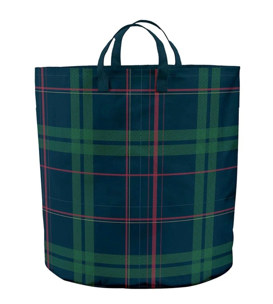 Large plaid canvas tote in dark blue, green, and red with two fabric handles. Available in large.