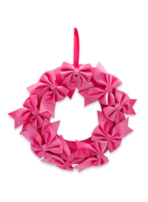 Pink bow wreath with hanging ribbon.