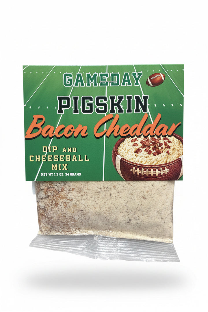 Game Day Collection Dip Mix, football field design, clear window shows powder mix. Sizes available: single-serve and family pack.