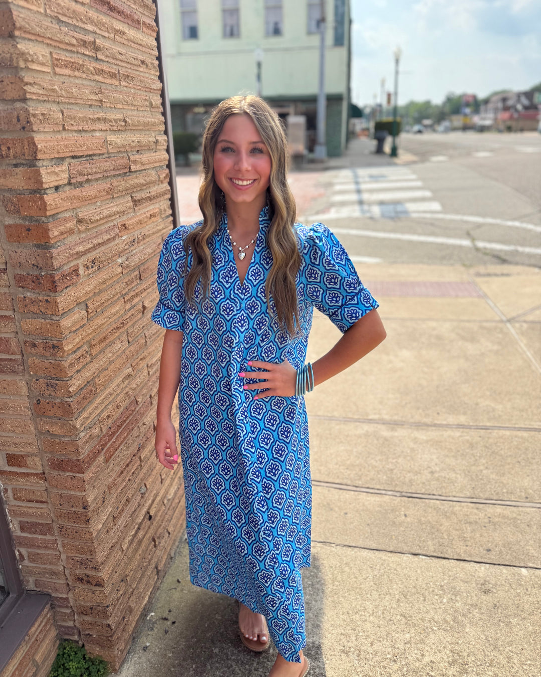 Bright Blue Printed Button Down Midi Dress with ruffled collar; available in sizes XS-XL.