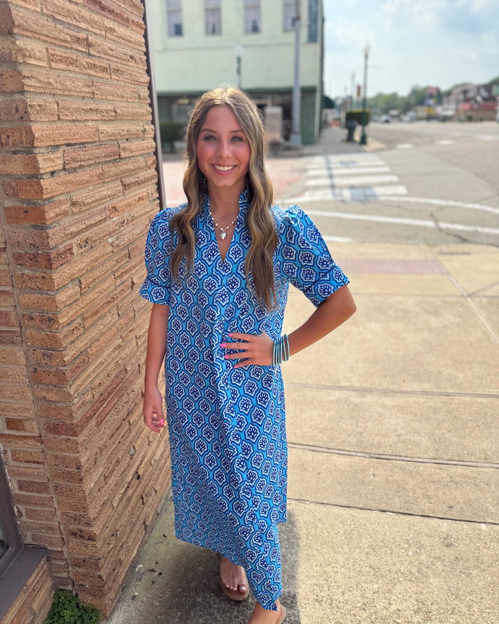 Bright Blue Printed Button Down Midi Dress with ruffled collar; available in sizes XS-XL.