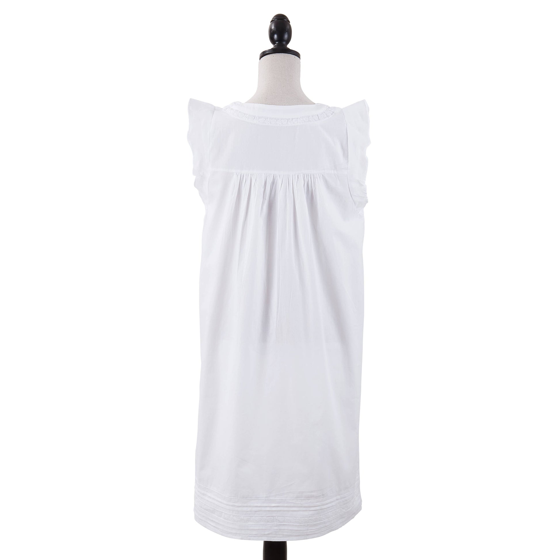 White knee-length nightgown, sleeveless with ruffled shoulders and gathered back. Loose fit. Sizes: S, M, L, XL.