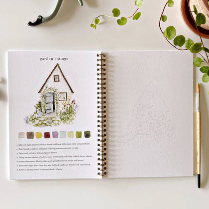 The Garden Watercolor Workbook, open to a garden cottage tutorial with swatches and instructions. Available in multiple sizes.