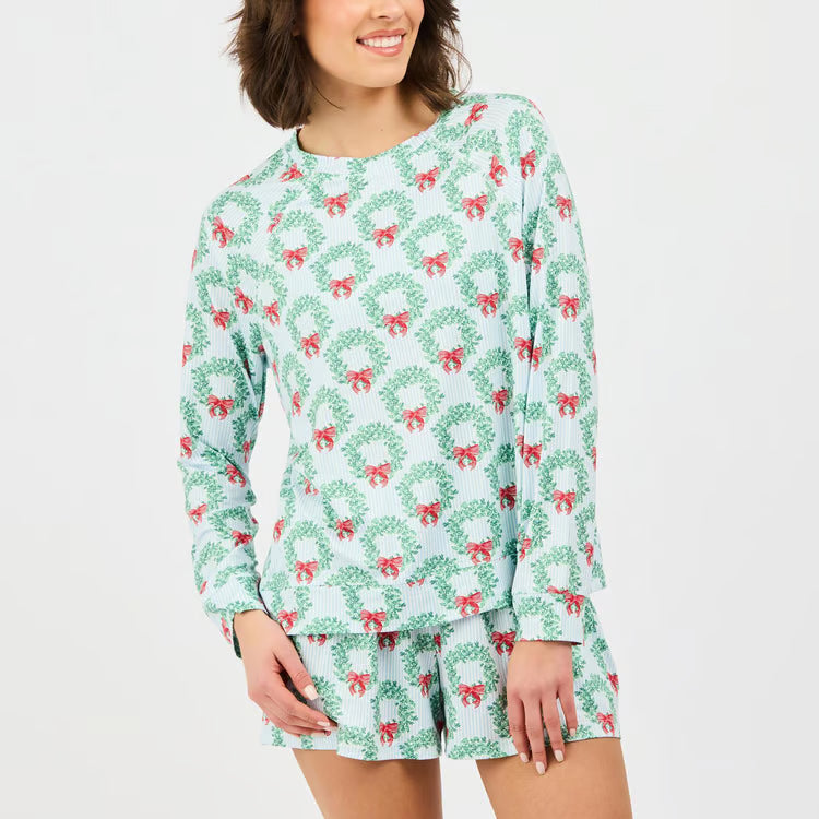 Annie Wreath &amp; Ribbon Short Set in light blue pinstripe with a holiday wreath and red bow print. Long-sleeve top and shorts.