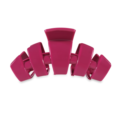 Pink TELETIES Classic Claw Hair Clip with large prongs and curved shape. Available in small, medium, and large sizes.
