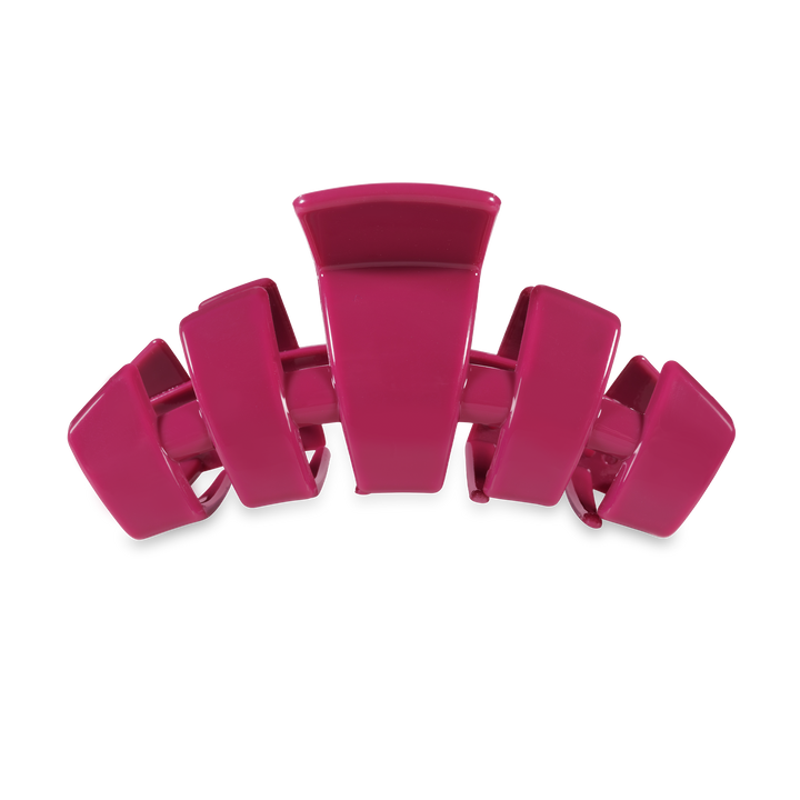 Pink TELETIES Classic Claw Hair Clip with large prongs and curved shape. Available in small, medium, and large sizes.