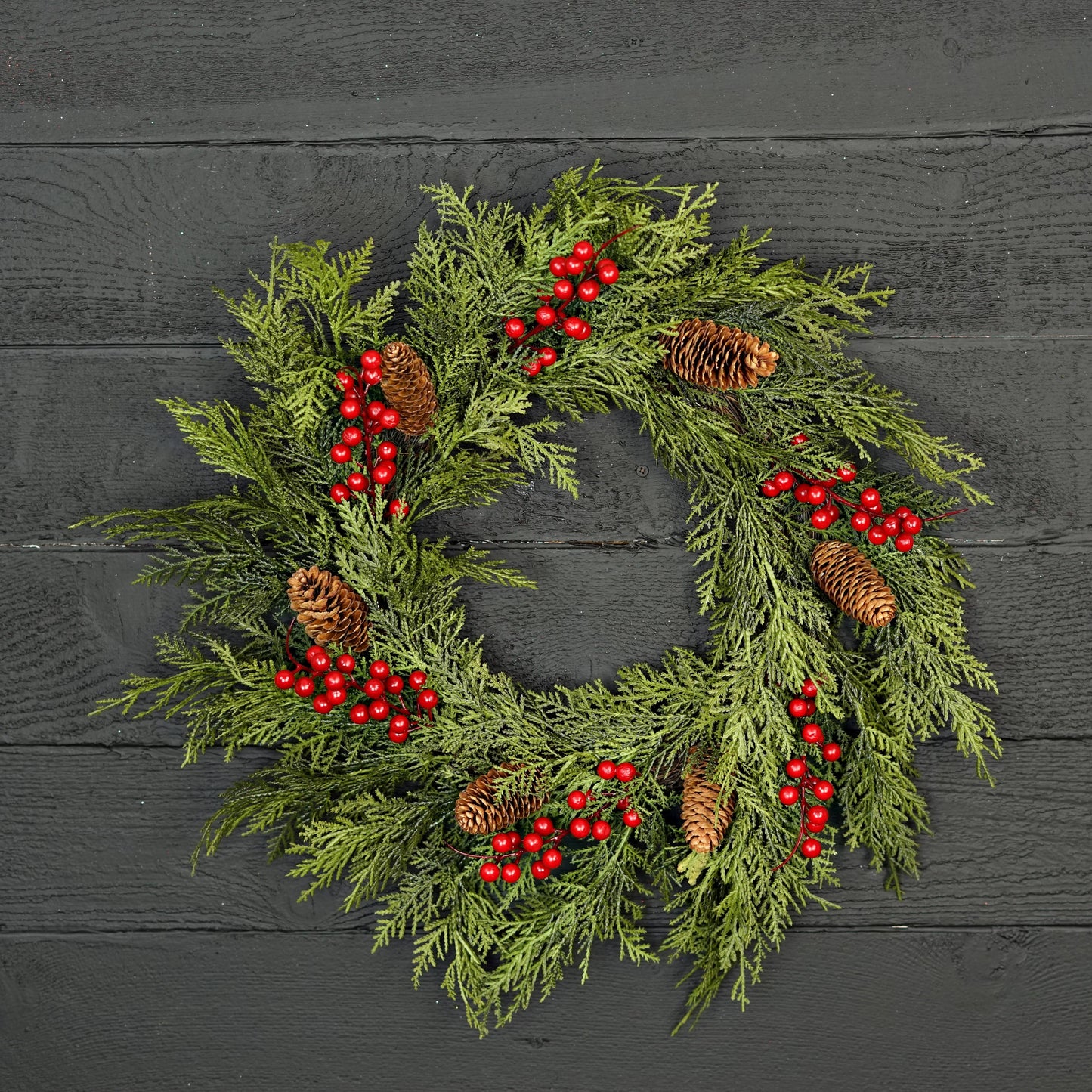 22-inch twig wreath, “510050-22in Twig Wreath-Superior Real Touch Mix Cedar w.Red,” with lifelike cedar, pinecones, and red berries. Size: 22 inches.