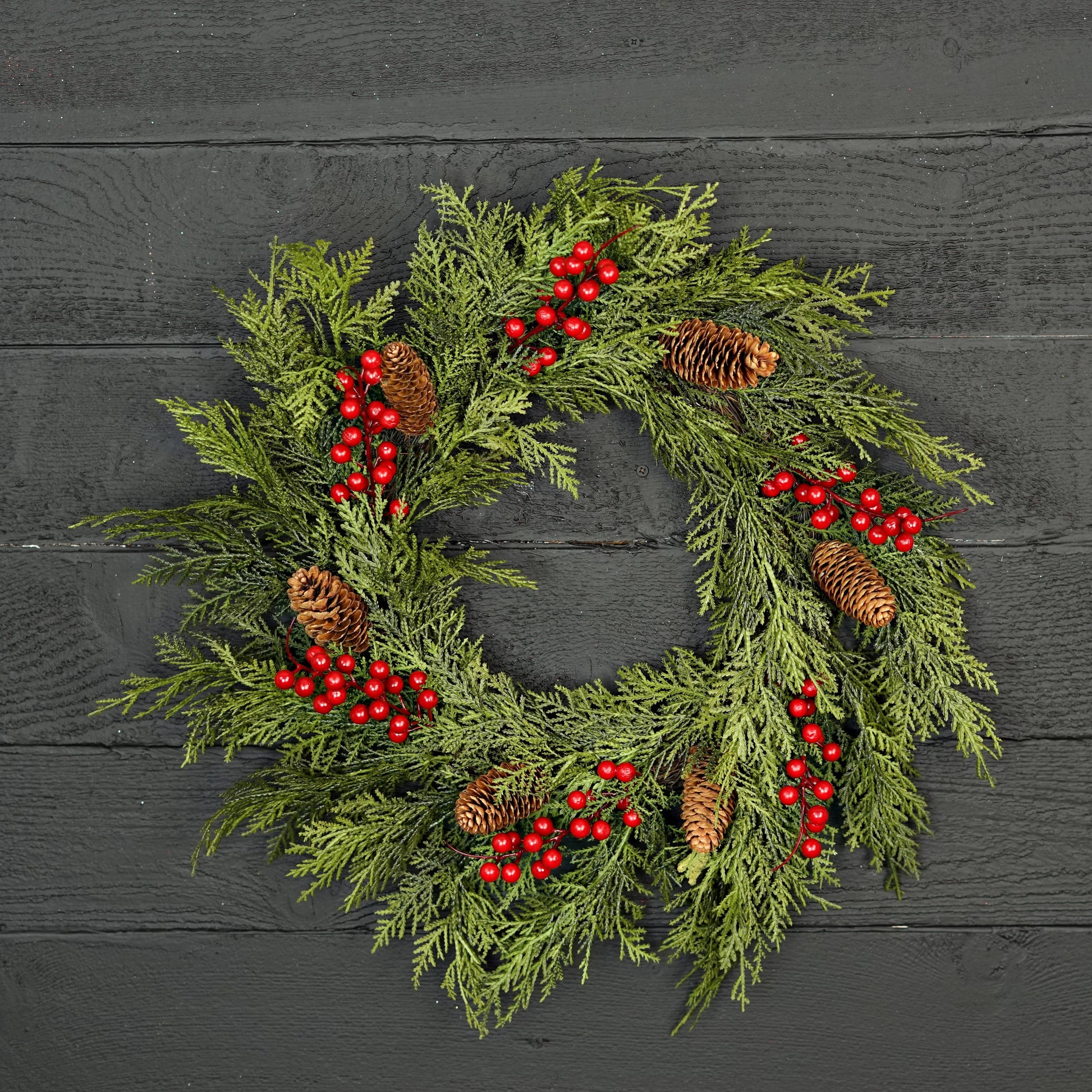 22-inch twig wreath, “510050-22in Twig Wreath-Superior Real Touch Mix Cedar w.Red,” with lifelike cedar, pinecones, and red berries. Size: 22 inches.