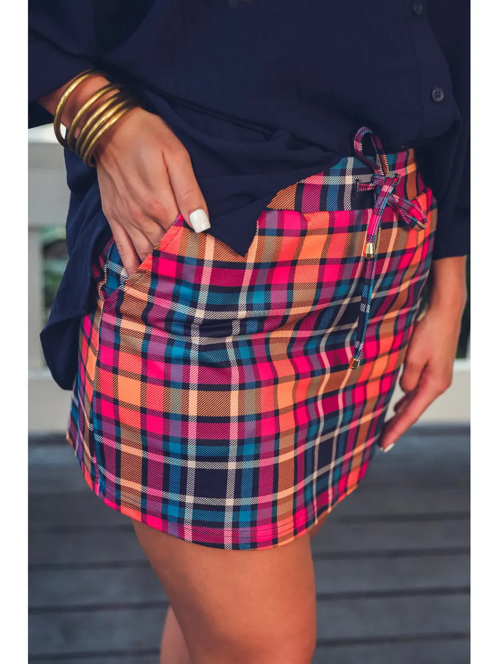 Patterned in Plaid Skort with elastic waistband, available in sizes XS–XL.