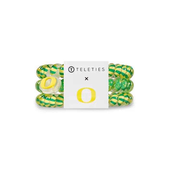 Three green, yellow, and white TELETIES spiral hair ties with a University of Oregon "O" logo card; available in small and large sizes.