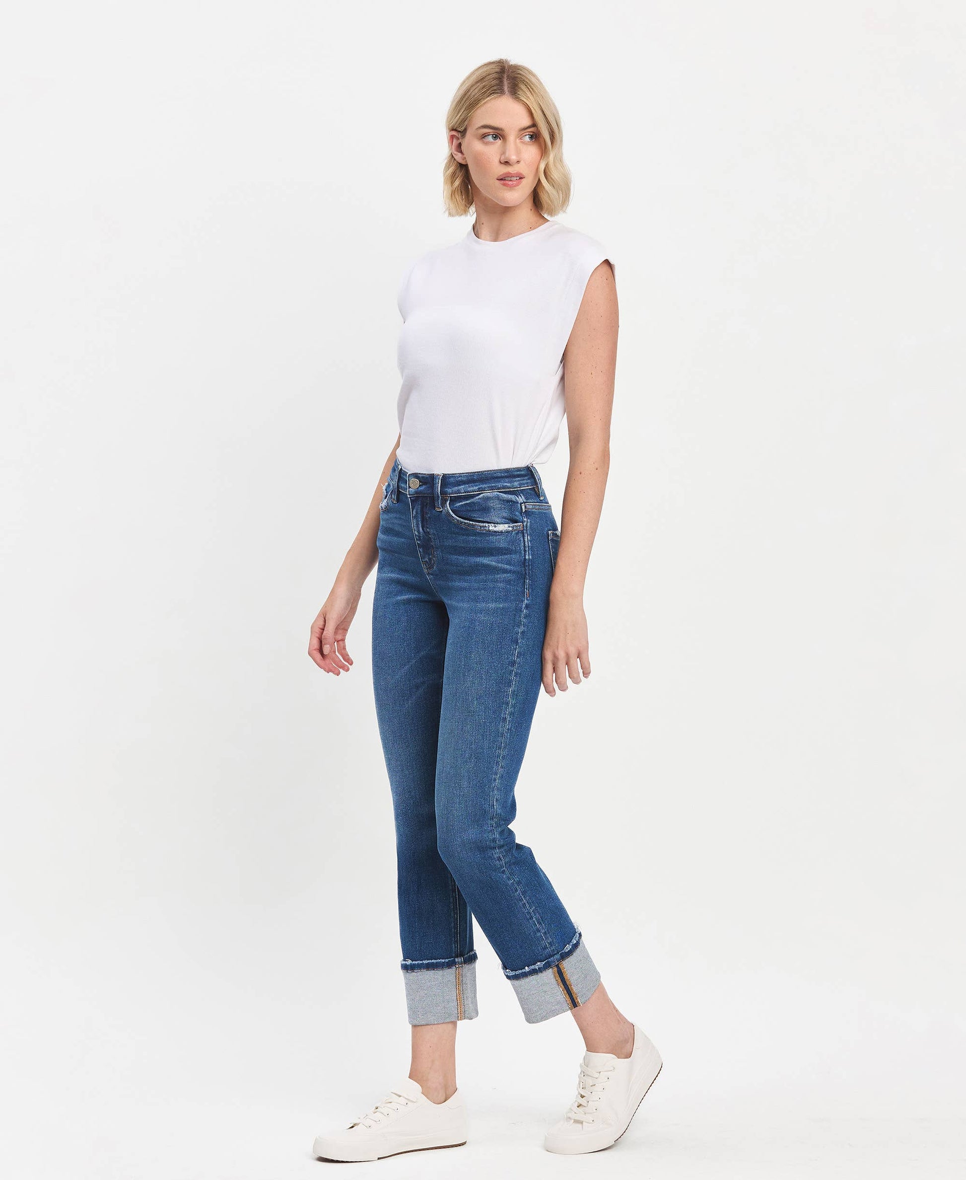 High Rise Cuffed Slim Straight Blue Jeans. Available in sizes 24-32.