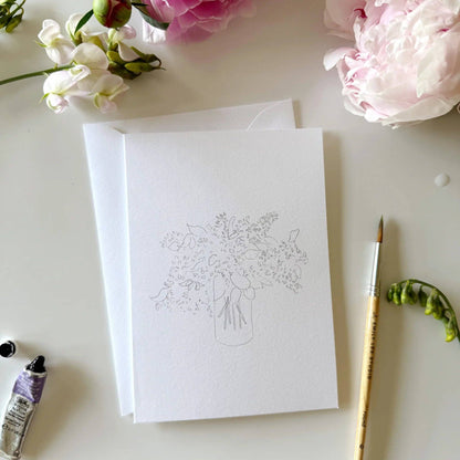 Bouquets paintable watercolor notecard set with a blank card featuring a sketched vase of flowers. Sizes available: standard notecard.