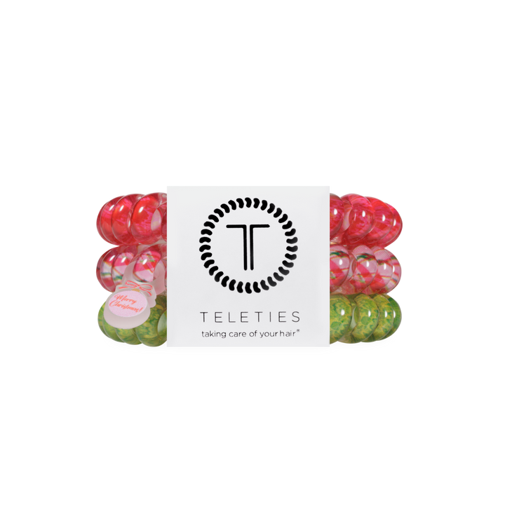 And to All a Good Night large red, pink, and green spiral coil hair ties with Merry Christmas tags.