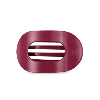 Maroon, oval TELETIES Flat Round Hair Clip with three drainage slits; available in medium and large sizes.