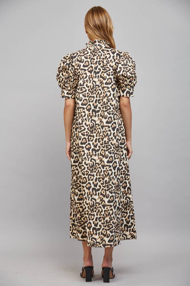 Ivory animal print midi dress with a ruffled high neckline, button-down front, and short puff sleeves. Available in size M.