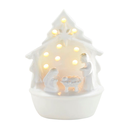 Light-Up Nativity Sitter" - White ceramic figurine shaped like a Christmas tree. Features Mary, Joseph, and baby Jesus with illuminated LED lights. Battery included. Sizes available: Small, Medium, Large.