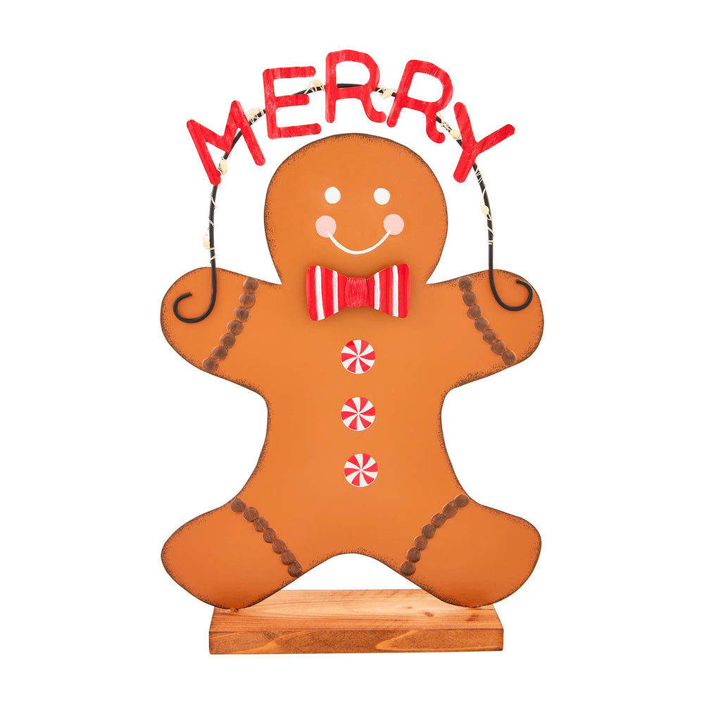 Tin Gingerbread Sitter with “MERRY” sign, striped bowtie, and peppermint buttons on a wooden base.