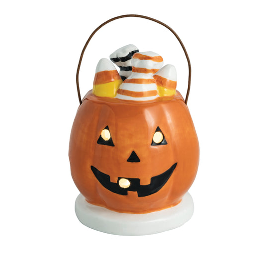 Smiling ceramic jack-o'-lantern basket with LED light, top handle, candy; available in small and medium sizes.