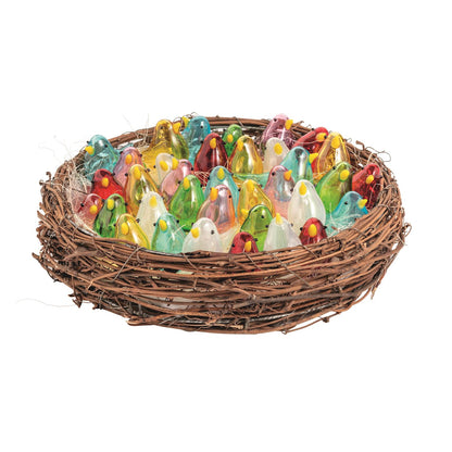 Mini Glass Birds set in a woven nest, in red, yellow, green, pink, and blue. Available in small and medium sizes.