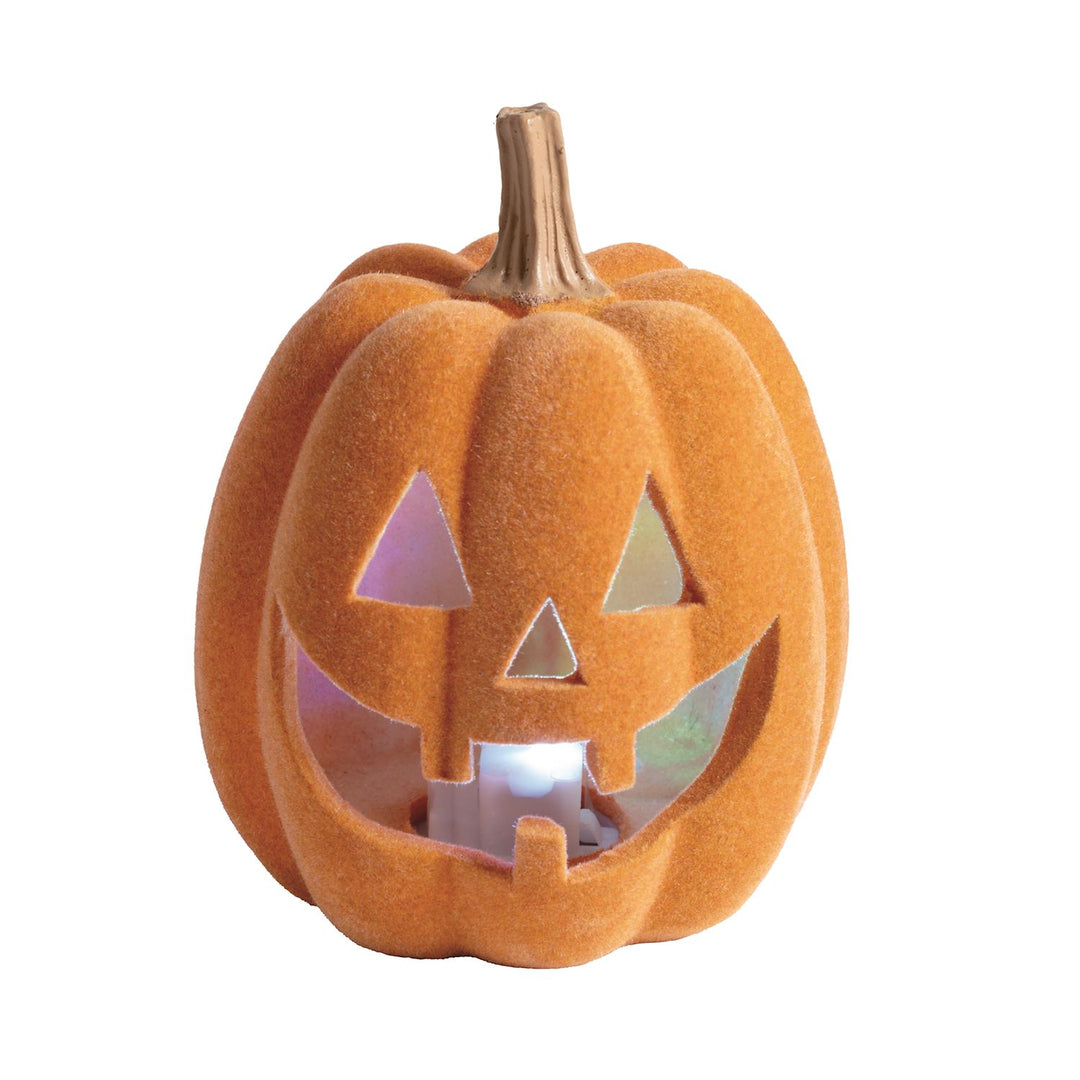 Light-Up Flocked Jack-O-Lantern Decor features a soft orange flocked surface, classic carved face with triangular eyes, and warm LED glow from within. Available in multiple sizes.