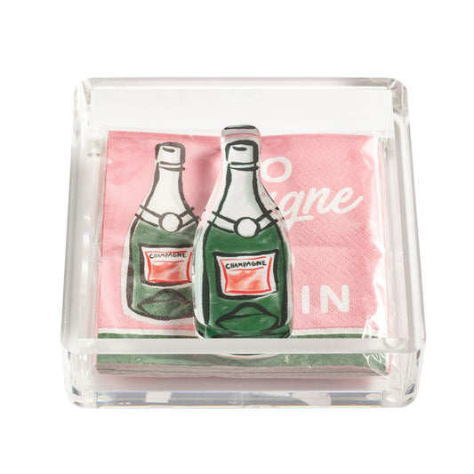 Acrylic Napkin Holder & Weight Set with pink cocktail napkins, "CHAMPAGNE" bottle design. Sizes: standard cocktail.