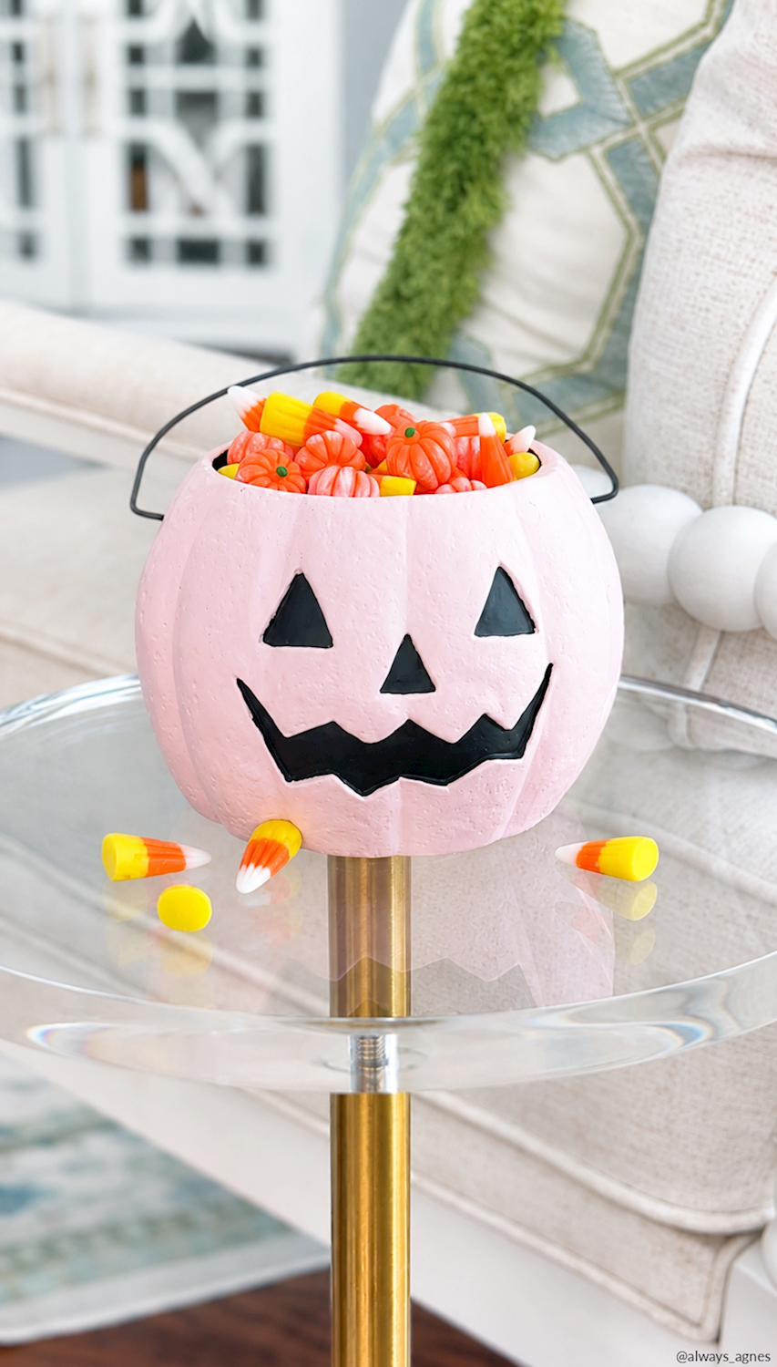 Mini Halloween Treat Bucket in pink pumpkin style with jack-o’-lantern face; hand-painted, available in three styles.