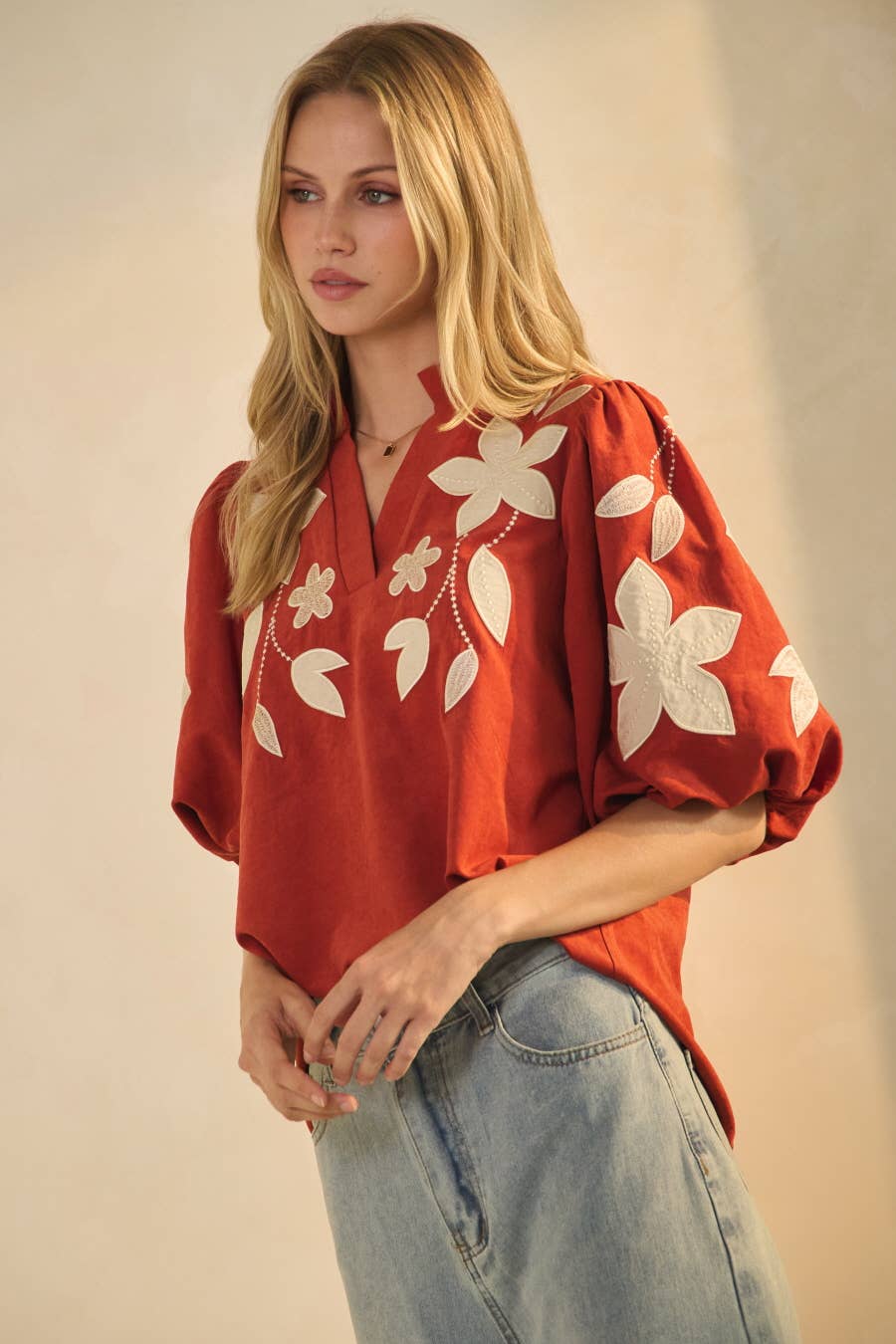 Camel washed suede top, available in plus sizes.