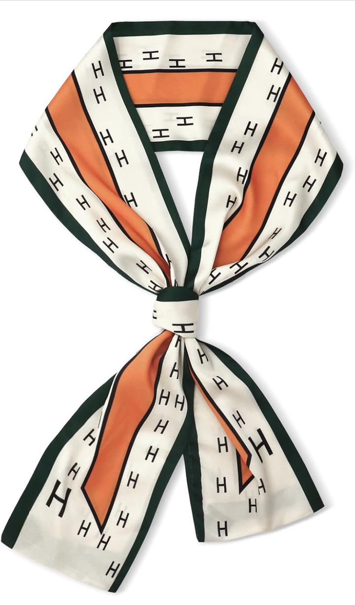 Silk scarf with green border, orange and white sections, repeating black "H" pattern. Available in S, M, L.