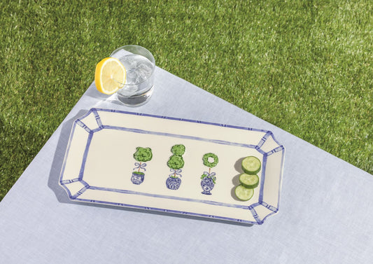 The Topiary Tray: blue and white ceramic, fluted edge, painted topiary trees. Available in 10", 12", and 14" sizes.