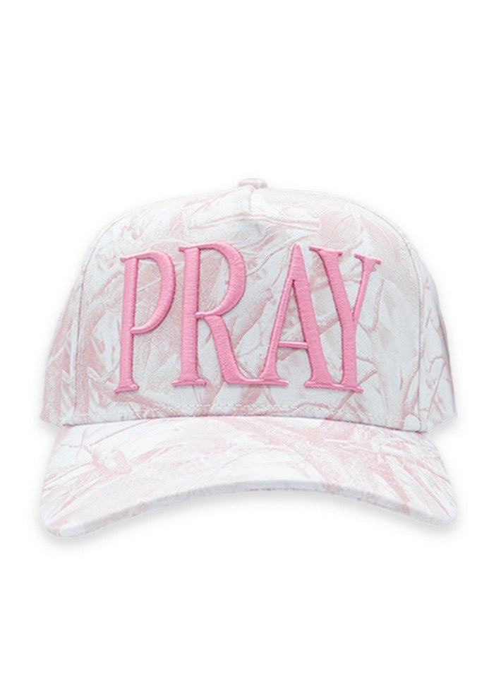 Pink Camo PRAY Trucker Hat with light pink and white marble pattern, “PRAY” embroidered in large pink letters on front. Available sizes: adjustable fit.
