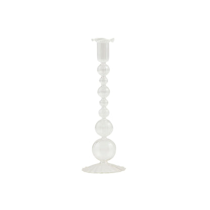 The Glass Taper Holder is a tall, transparent candlestick with stacked sphere stem and wide textured base. Sizes: One size only.