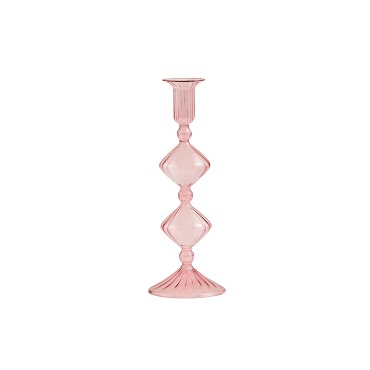 Hand-blown pink Glass Taper Holder with a tall, slim design, features diamond-shaped stem accents and a round, fluted base and top. Sizes available: 10-inch and 12-inch heights.