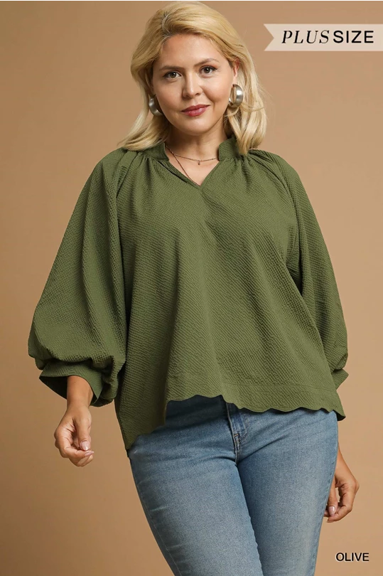 Olive green textured scalloped hem blouse with balloon sleeves, plus size. Available sizes: XL-4X.