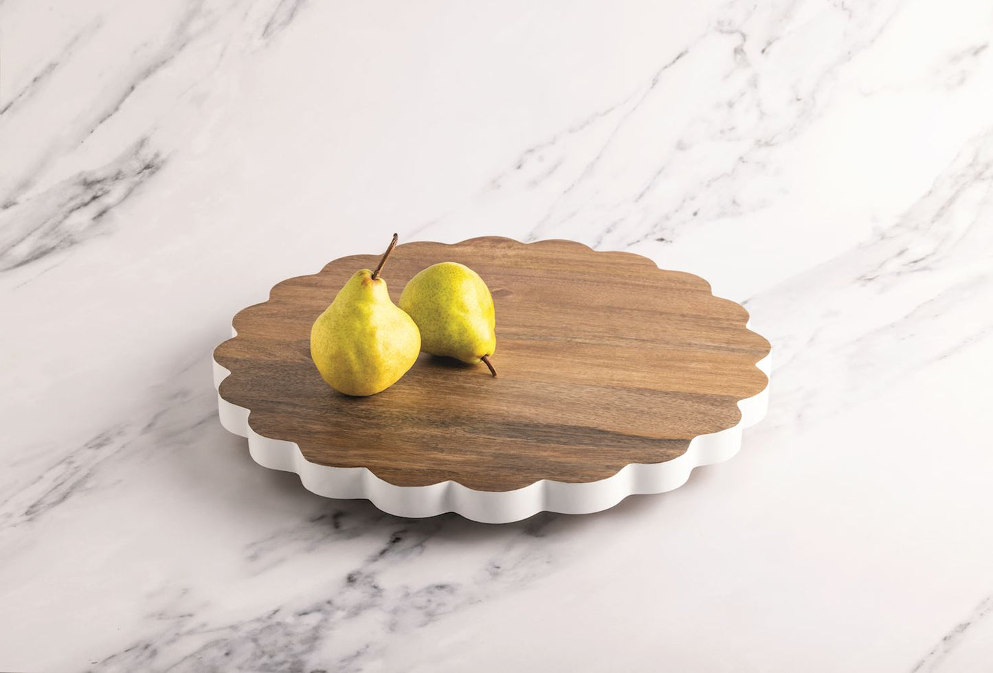 Round scalloped Lazy Susan with white sides, crafted from mango wood. Available in 14", 18", and 24" sizes.