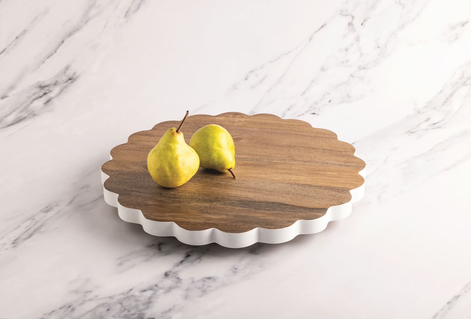 Round scalloped Lazy Susan with white sides, crafted from mango wood. Available in 14", 18", and 24" sizes.