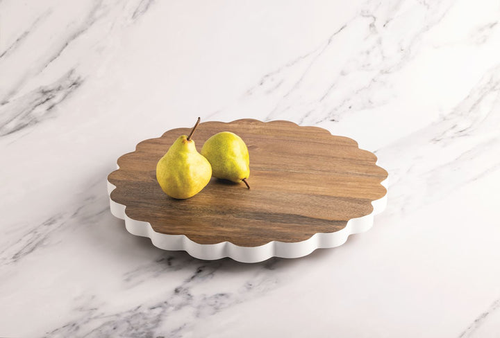 Round scalloped Lazy Susan with white sides, crafted from mango wood. Available in 14", 18", and 24" sizes.
