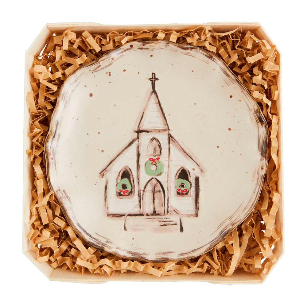 Nativity Trinket Dishes: a round, speckled stoneware dish featuring a hand-drawn church illustration with green wreaths.